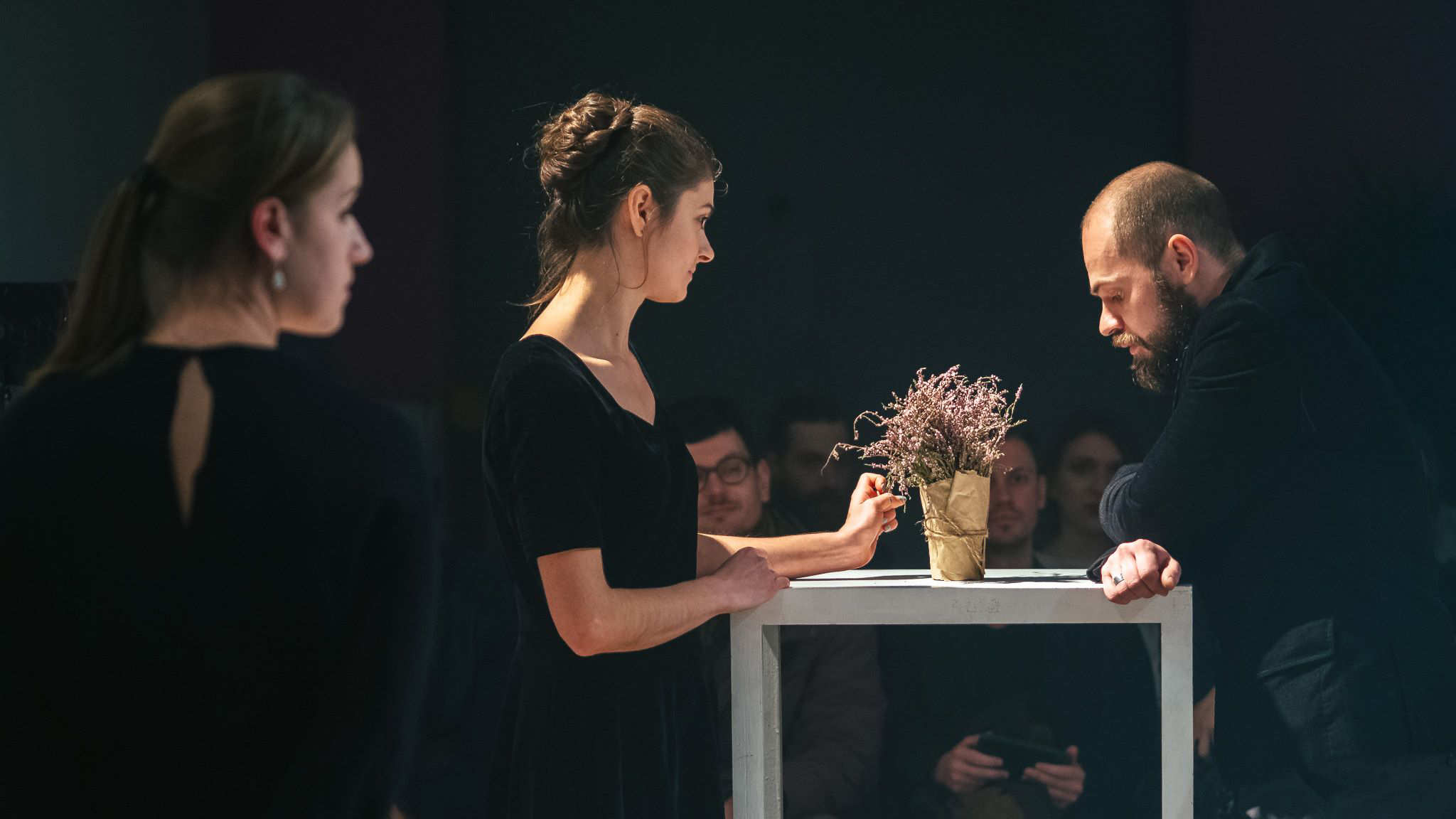 a man and a woman stand in silence in a new Ukrainian play